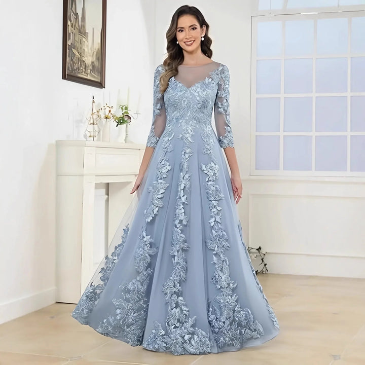 Light blue lace wedding gown with 3/4 sleeves, square neckline, fitted bodice, full skirt