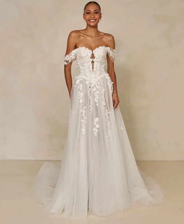 Ivory white floral lace bridal dress with off-shoulder neckline and full-length skirt