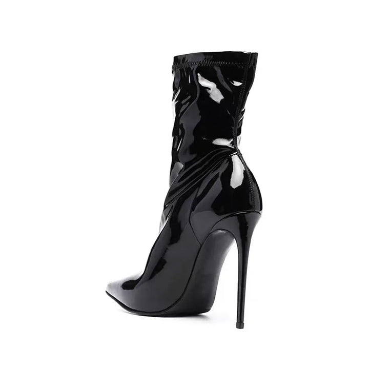 Black patent leather ankle heel boots, glossy pull-on style, pointed toe, stiletto heel