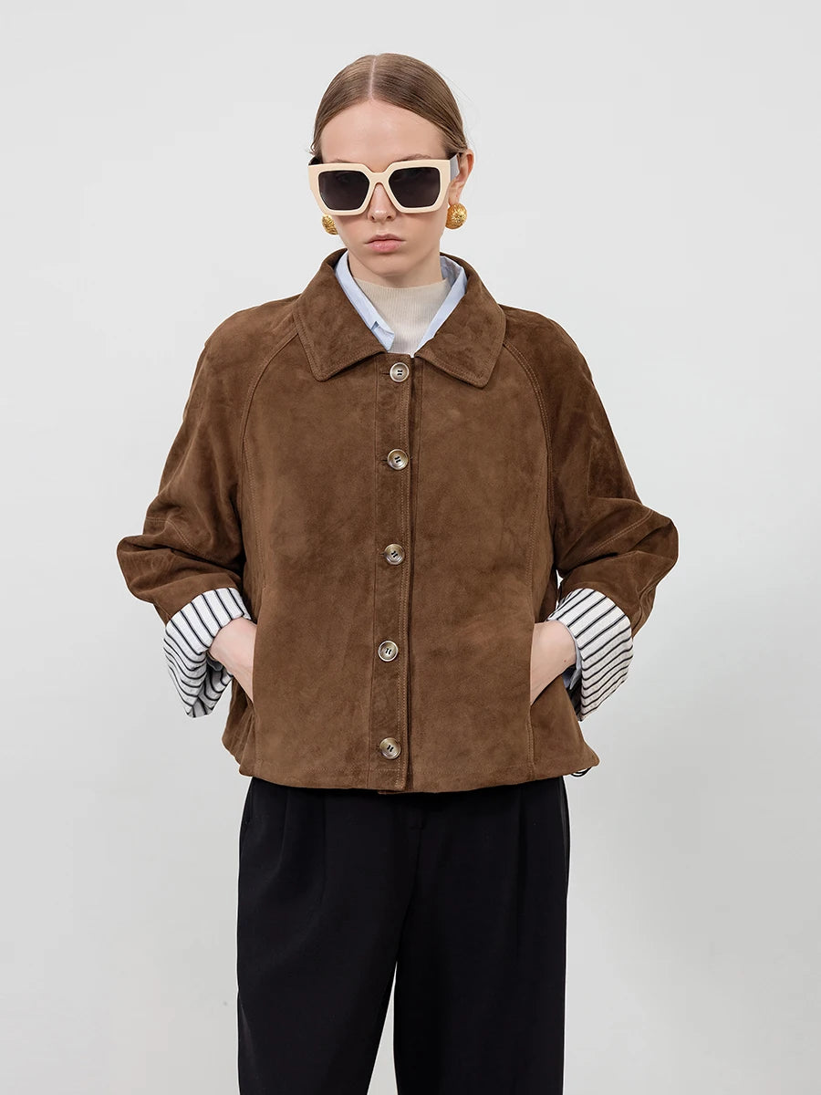 Brown suede women's loose coat jacket with button front, pointed collar, striped cuffs.