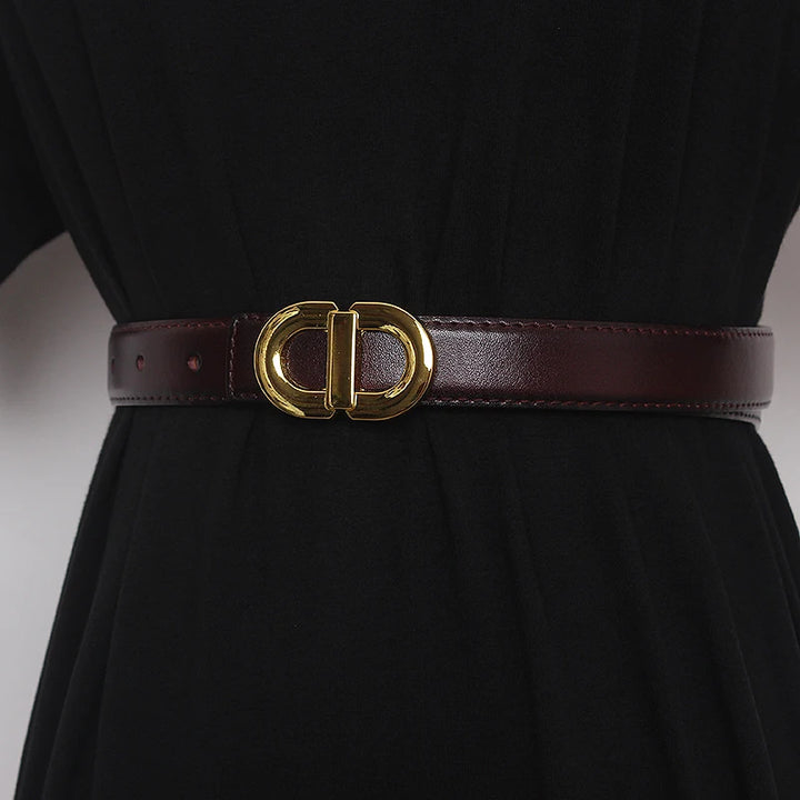 Dark brown narrow leather waist belt with gold-tone double D buckle and punched holes