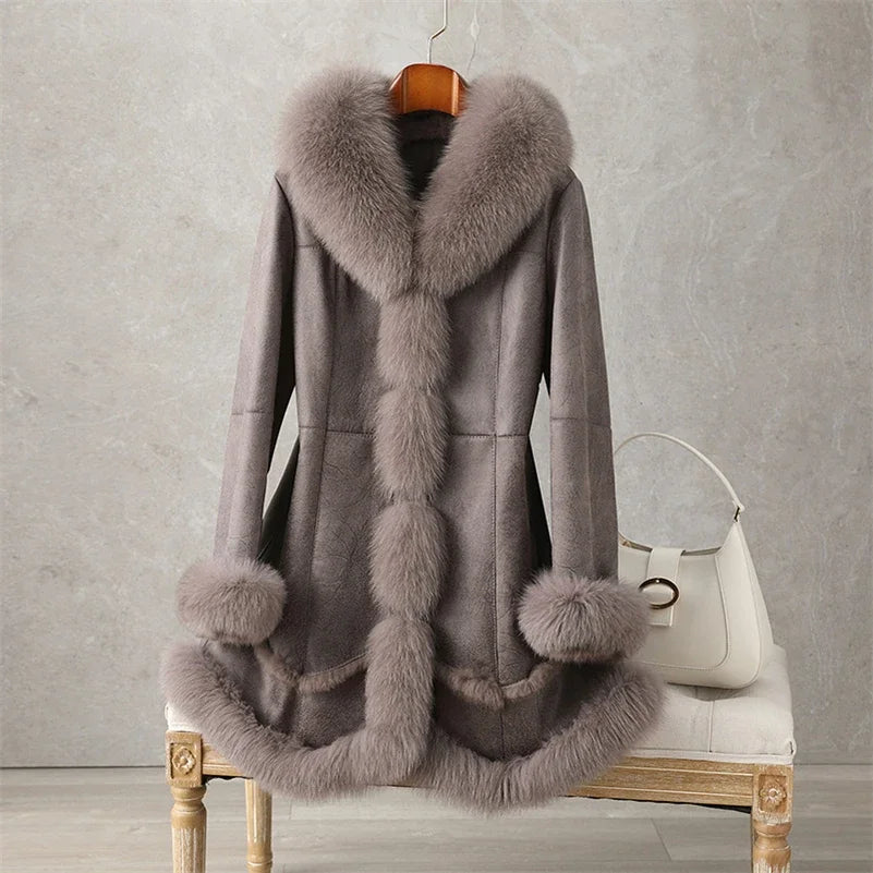 Grey women's trench coat with plush rabbit fur trim, hooded collar, and muff cuffs