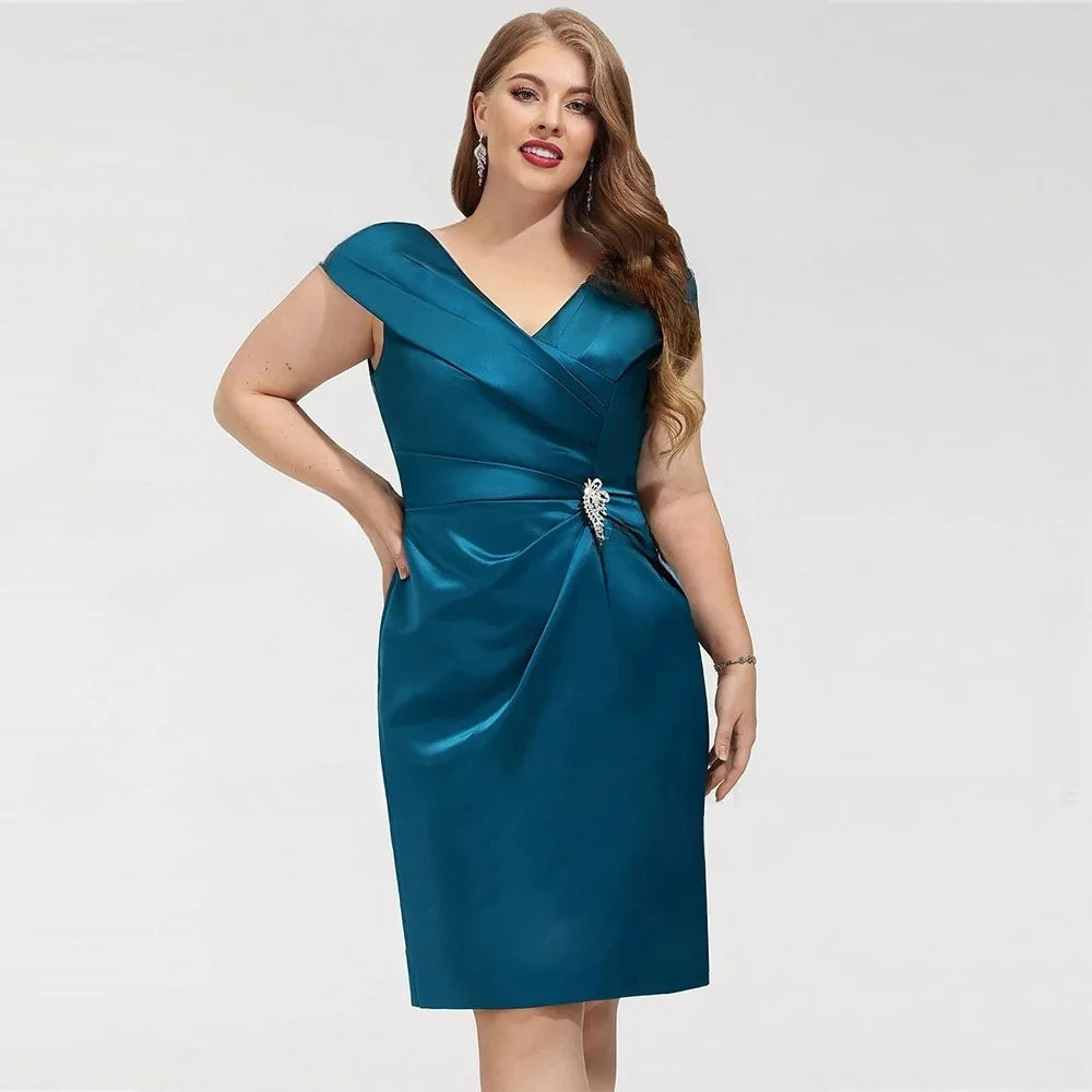Teal satin plus size formal dress with V-neck and jeweled waist pin