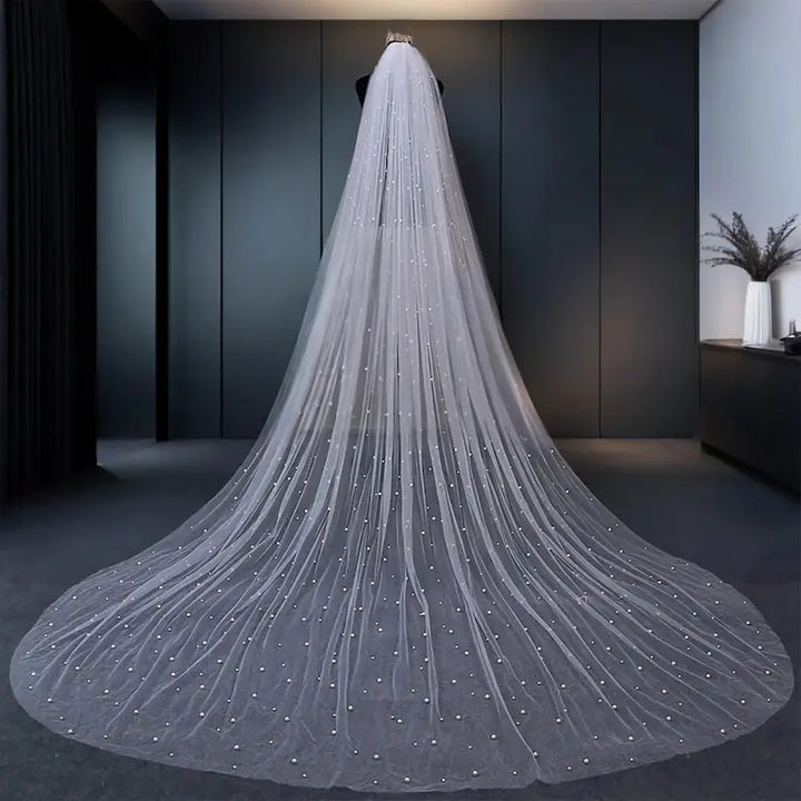 Ivory pearl-studded bridal veil, full-length sweeping from top edge