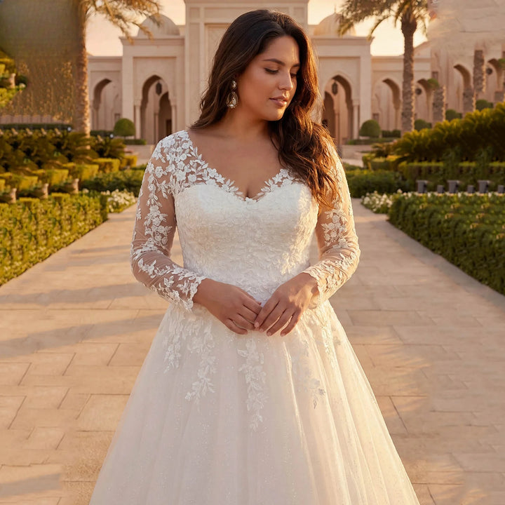 Ivory lace wedding dress bodice with long sleeves and A-line tulle skirt