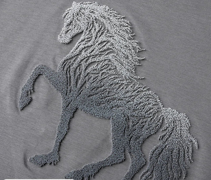 Grey crew-neck T-shirt with detailed horse embroidery close-up.