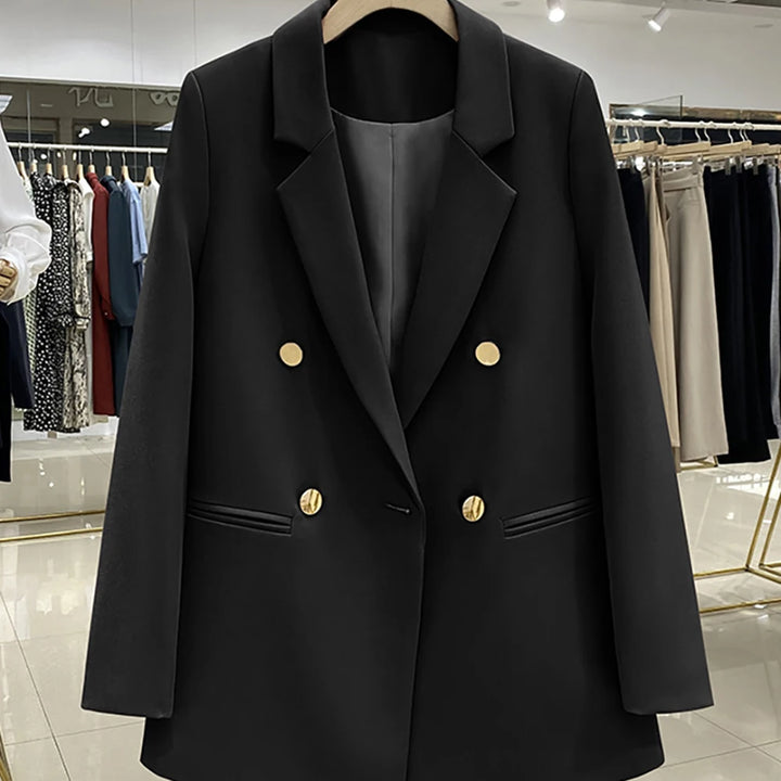 Black double-breasted blazer with notched turn-down collar and gold-tone buttons