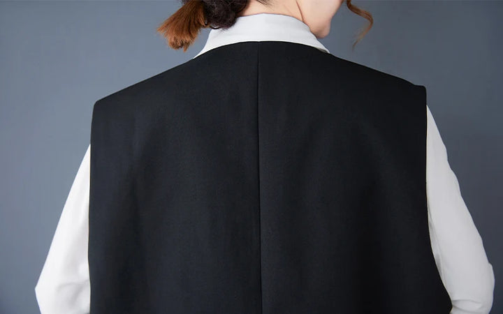 Black sleeveless waistcoat back view with clean center seam