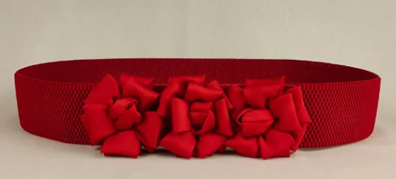 Red corset waist belt with three fabric flower appliques across the front