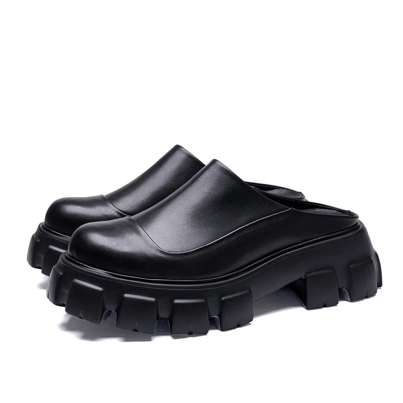 Men's black leather half slippers with chunky tread soles and slip-on design