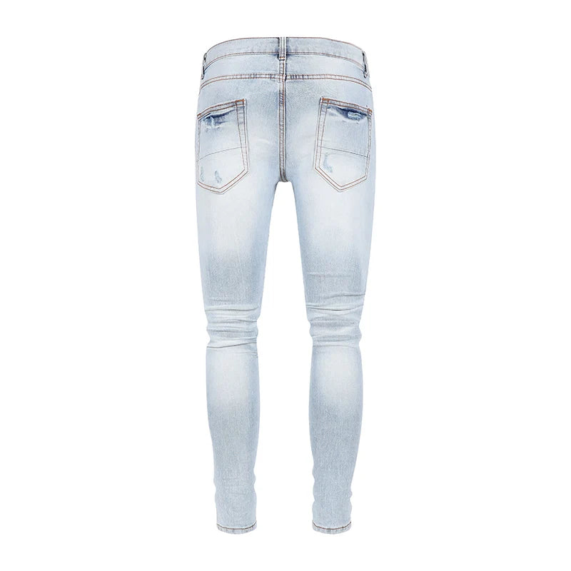 Trendy Perforated Patch Slim Jeans Pants