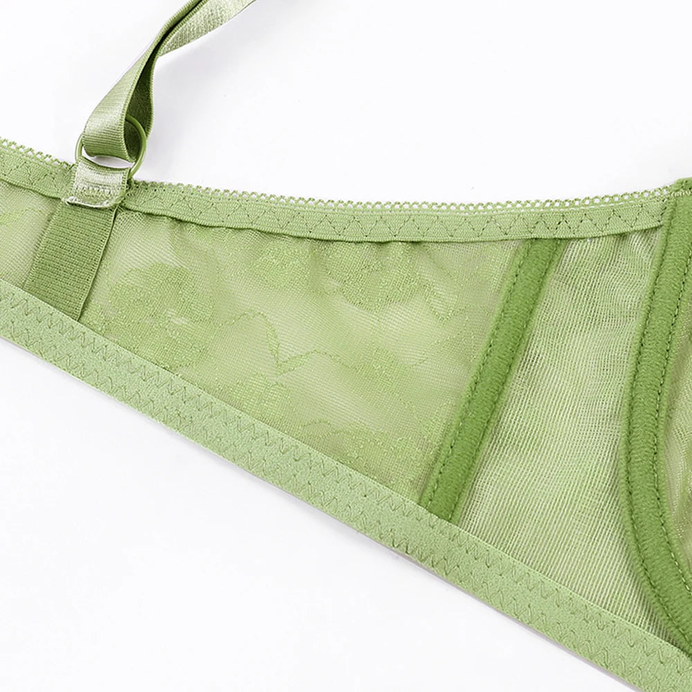 Green underwire lace bra, side view of mesh panel and underband trim
