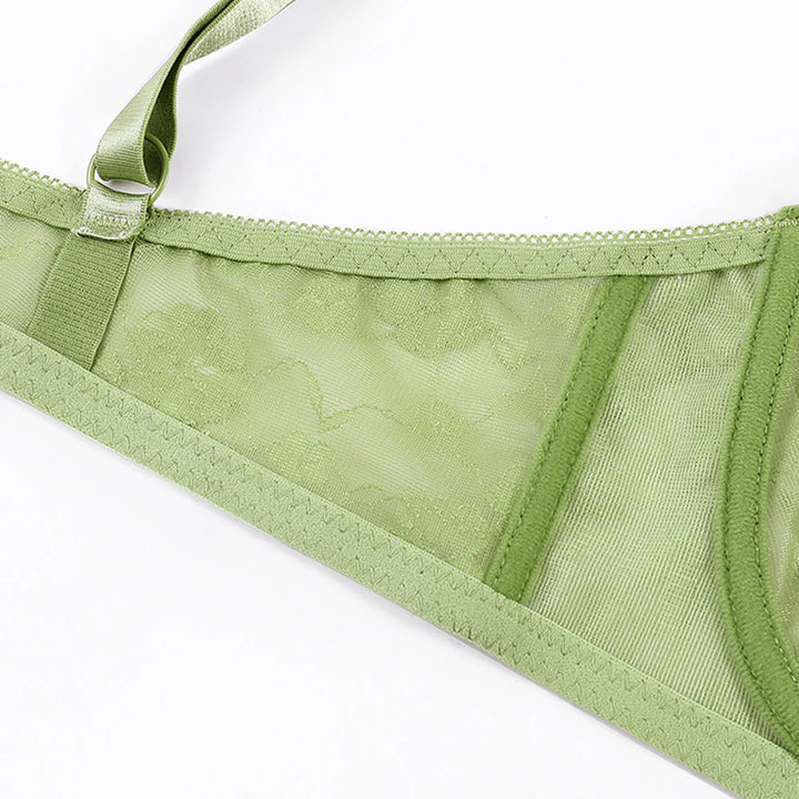Green underwire lace bra, side view of mesh panel and underband trim