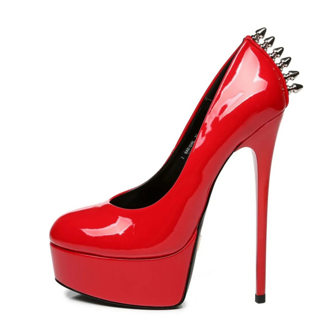 Red patent leather platform rivet heel pumps with pointed toe and black inner lining