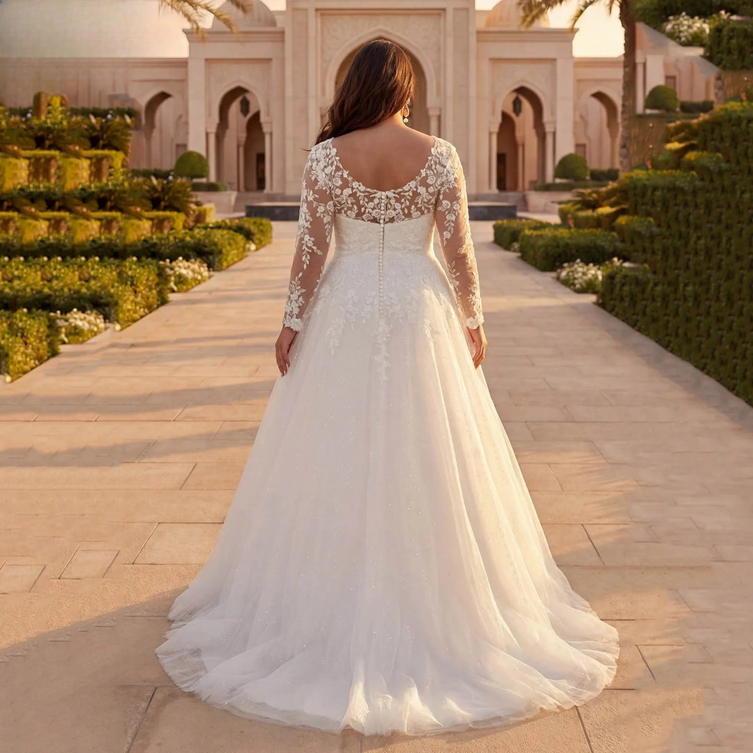 Ivory A-line tulle wedding dress from back view with lace illusion sleeves