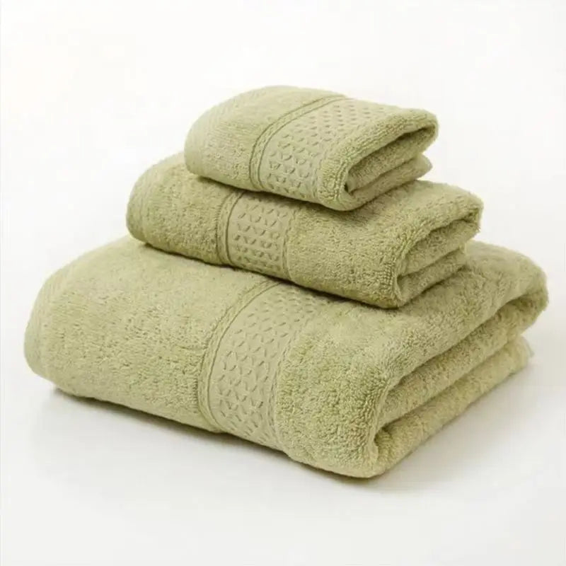 Pale green organic cotton towel set, 3-pc folded stack with textured bands and stitched edges