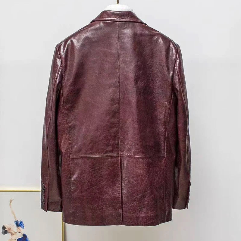 Women’s burgundy leather jacket, back view, stand collar, zip front