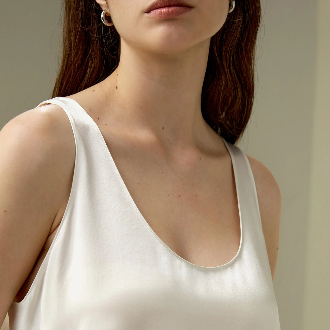 Women’s silk relaxed tank top neckline close-up, natural white scoop neck
