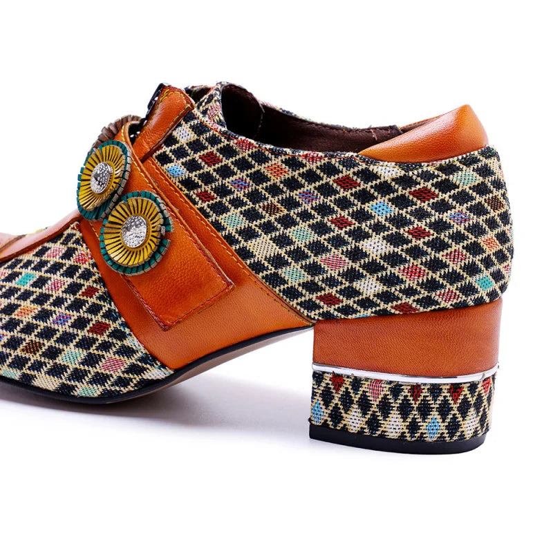 Orange low-heel slingback shoes with side strap, multicolor woven upper, and buckle