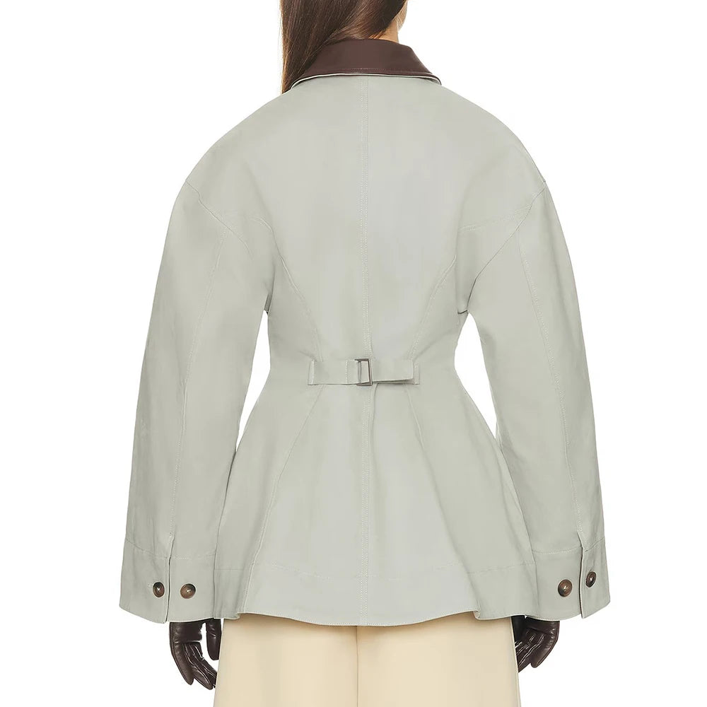 Women’s sage green zip-back lapel jacket with back tab and brown collar