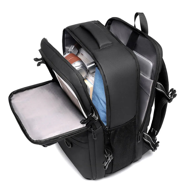 Black travel laptop backpack open view with padded compartments and laptop sleeve