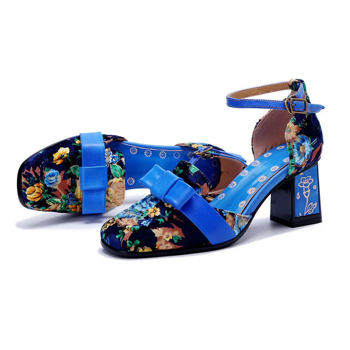 Blue floral ankle-strap heeled sandals with bow-like buckle and block heel