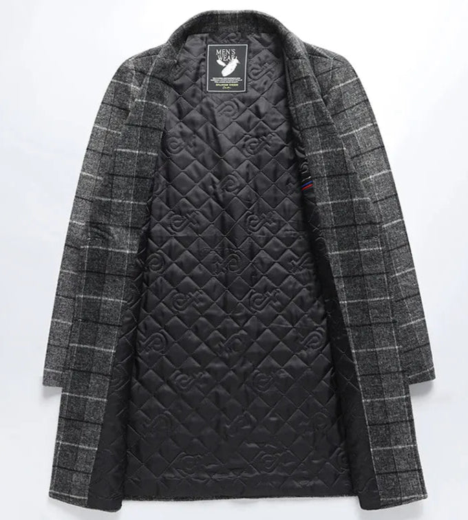 Gray quilted jacket with plaid pattern on a white background