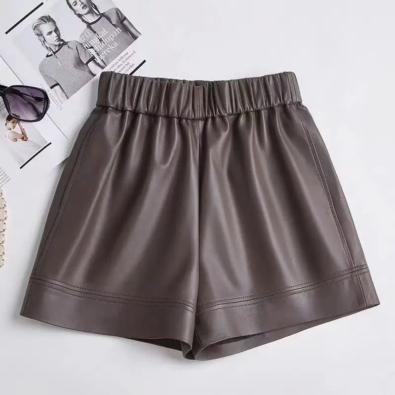 Women's leather shorts, dark grey with elastic waistband and pleated front