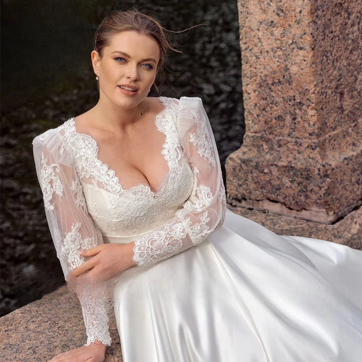 White satin bridal bodice with lace V neckline and sheer lace sleeves