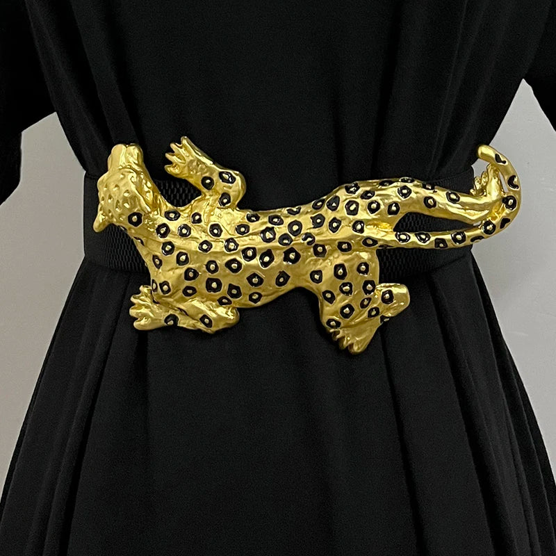 Yellow leopard-print elastic wide belt with metal-style cat detail on black dress