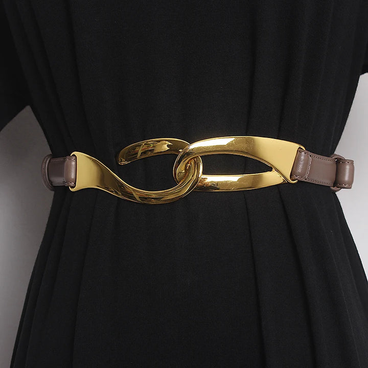 Leather corset waist belt with gold buckle and light tan leather straps