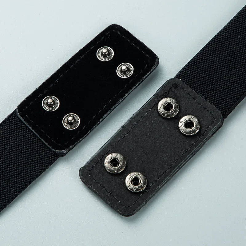 Corset waist belt end with black fabric strap and round metal snap studs