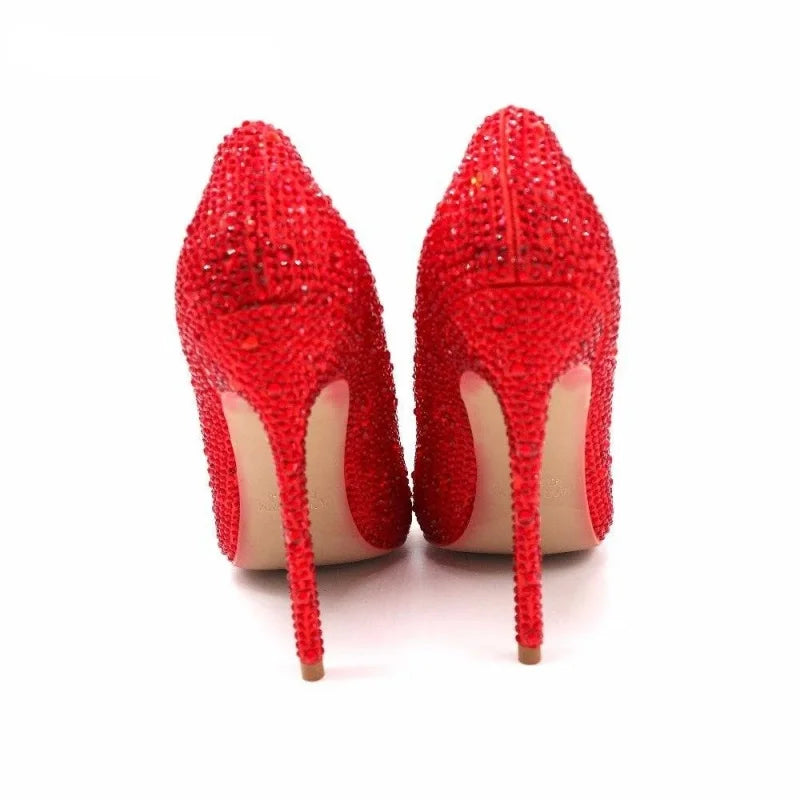 Red rhinestone pointed-toe high heel pumps, rear view pair, stiletto heels