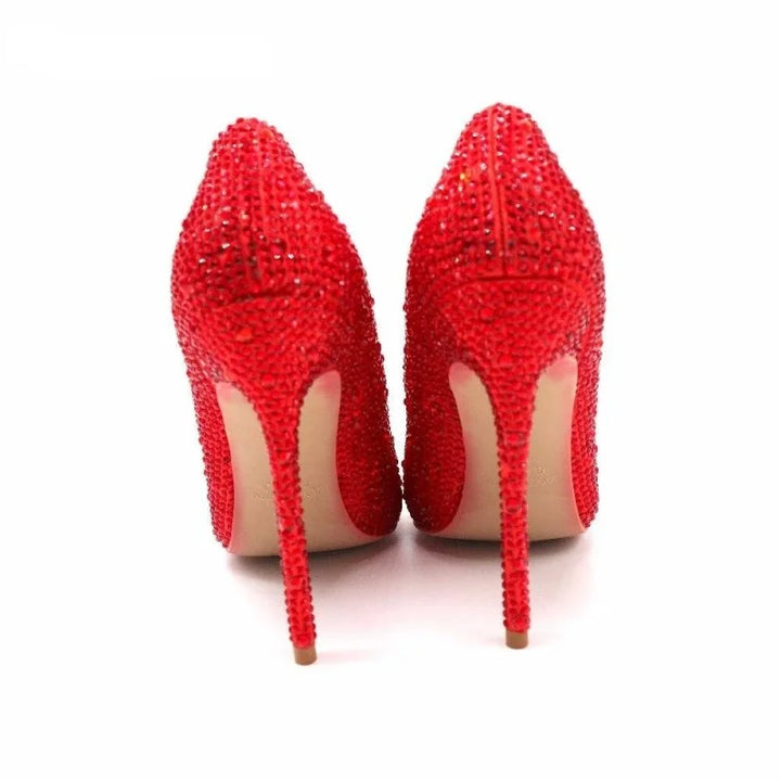 Red rhinestone pointed-toe high heel pumps, rear view pair, stiletto heels