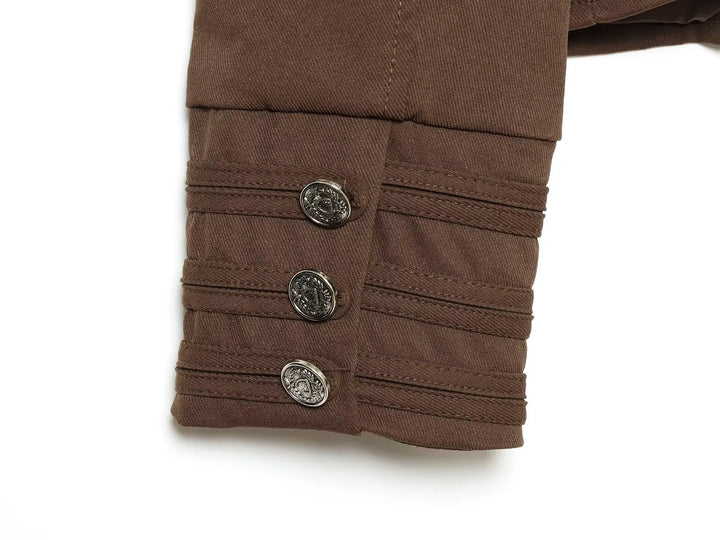 Brown blazer sleeve cuff with three round silver buttons and gathered ruffle