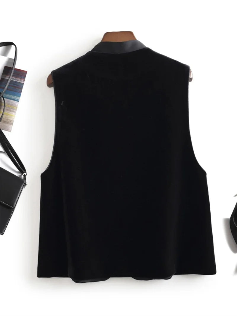Black women’s vest jacket back view with high neckline and clean hem