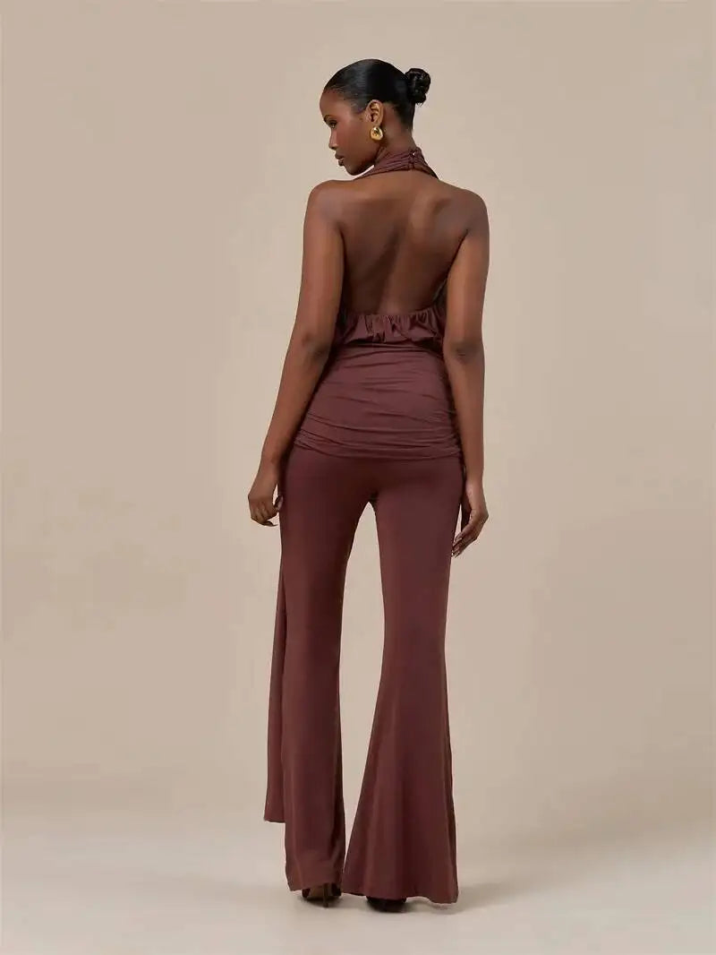 Brown backless ruched halter jumpsuit with open back and wide bell legs, rear view