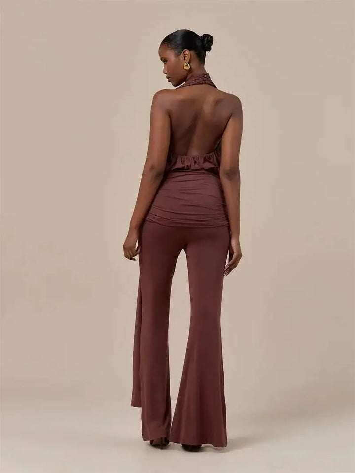 Brown backless ruched halter jumpsuit with open back and wide bell legs, rear view