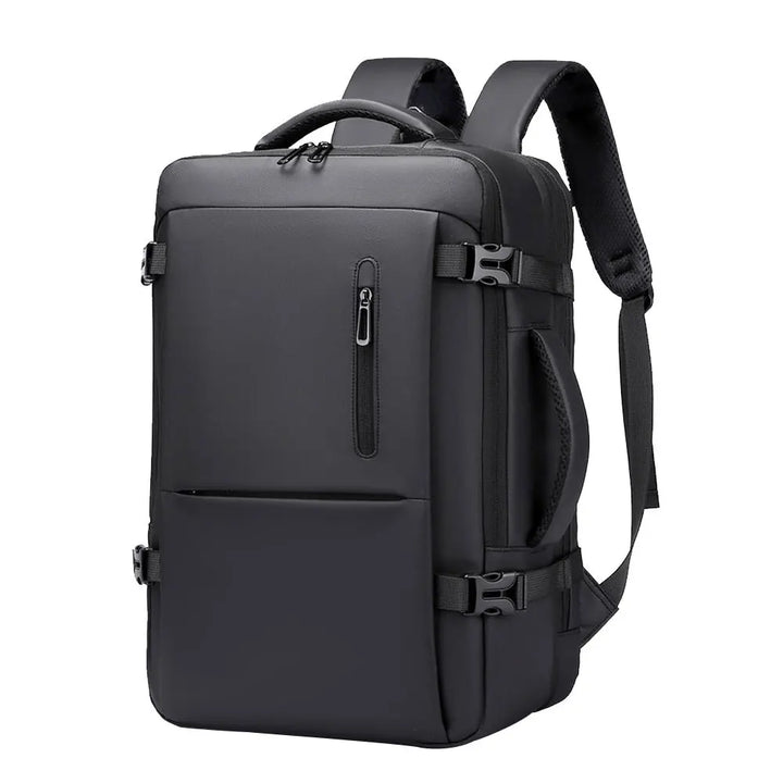 Dark travel backpack with zip front pocket, side straps, and adjustable shoulder straps