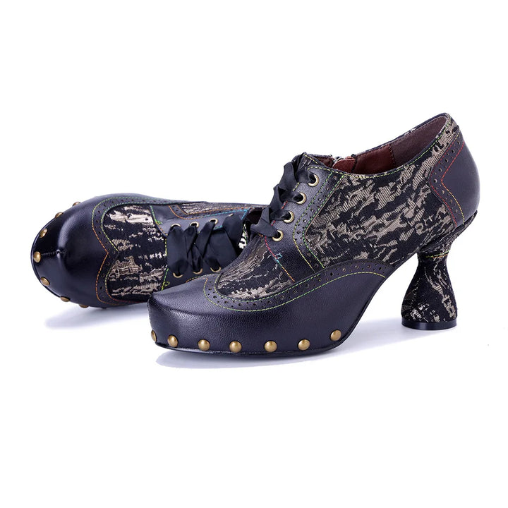 Dark printed leather lace-up heel pumps with rivet-studded platform and round toe