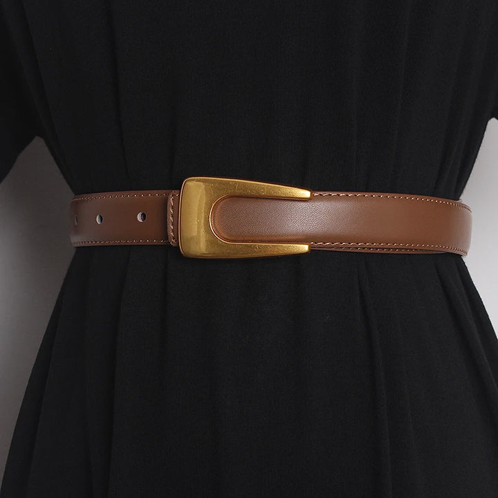 Narrow camel brown leather waist belt with gold-tone rectangular buckle and adjustment holes