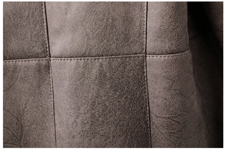 Grey suede-look trench coat fabric panel with stitched seams and texture