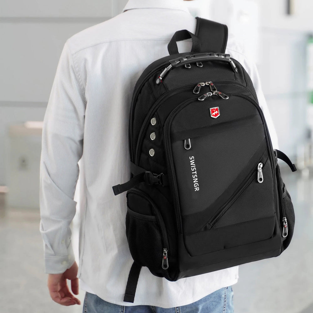 Men's waterproof laptop backpack worn by a man, front view with shoulder straps.