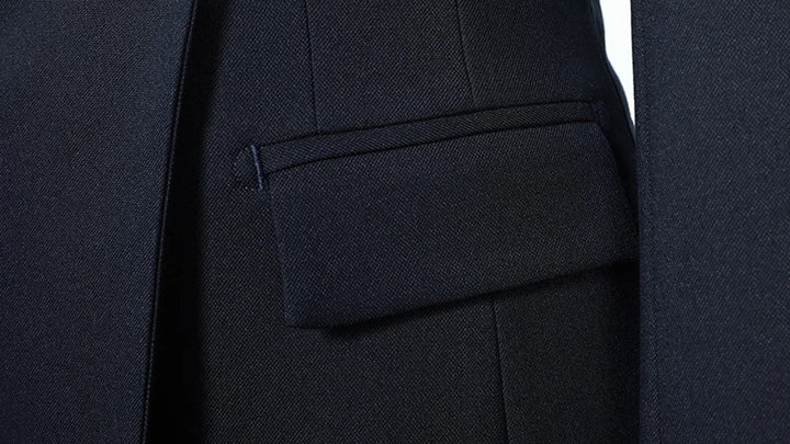 Navy blazer flip pocket design on skirt suit jacket