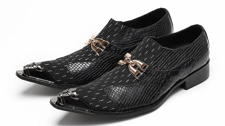 Pair of black textured slip-on leather oxford shoes with gold-tone buckles and low heel