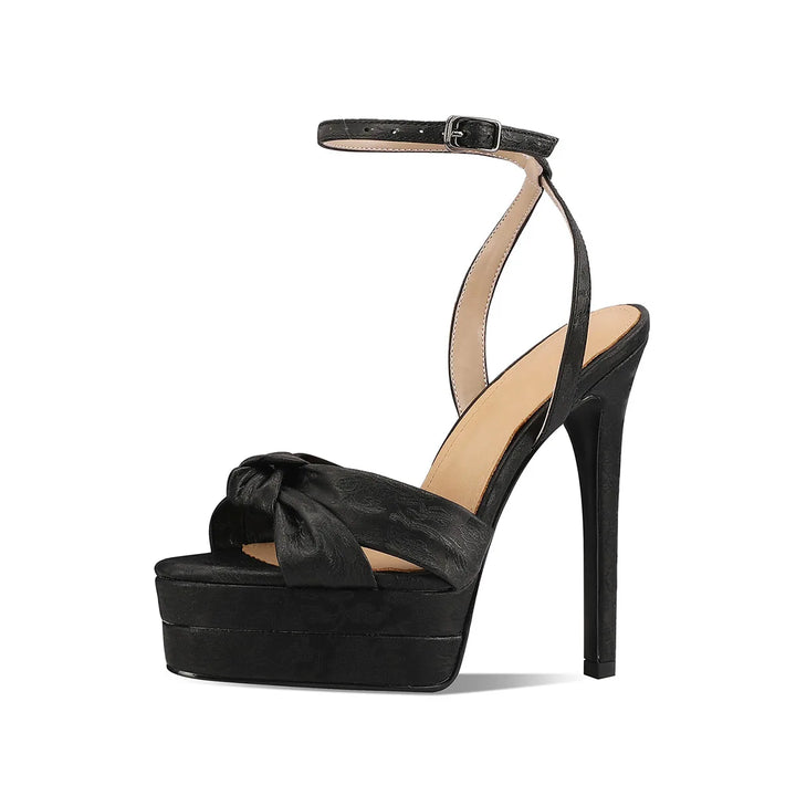 Black leather high-heel platform sandals with ankle strap and open toe