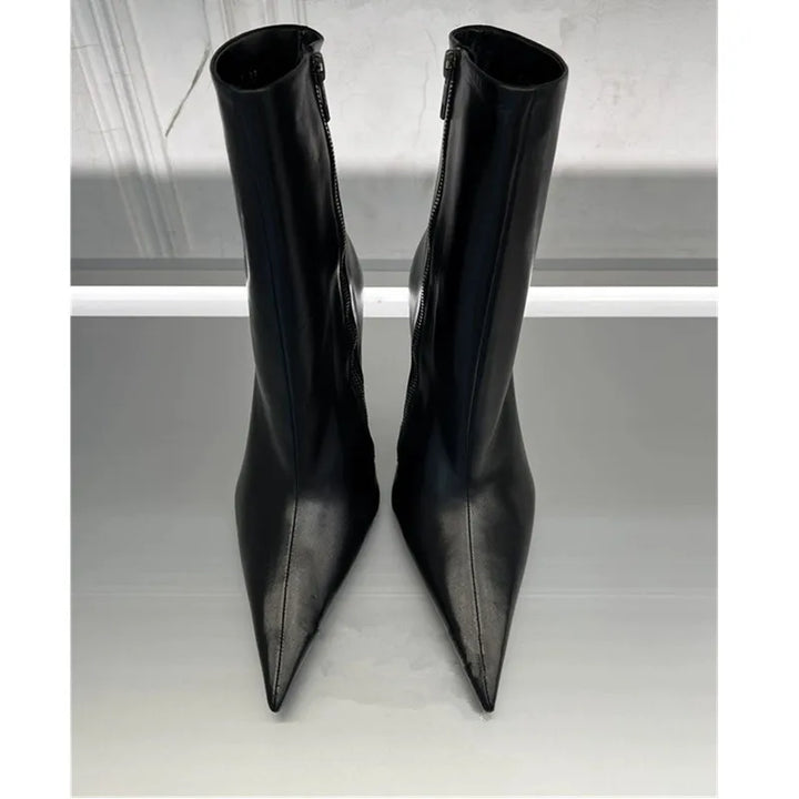 Black side-zip high heel boots, pointed toe, slim silhouette