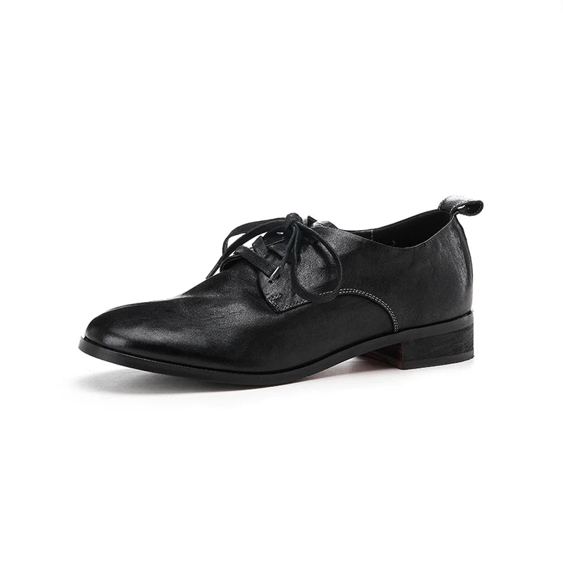 Black leather lace-up flat shoe with thin laces and low profile heel