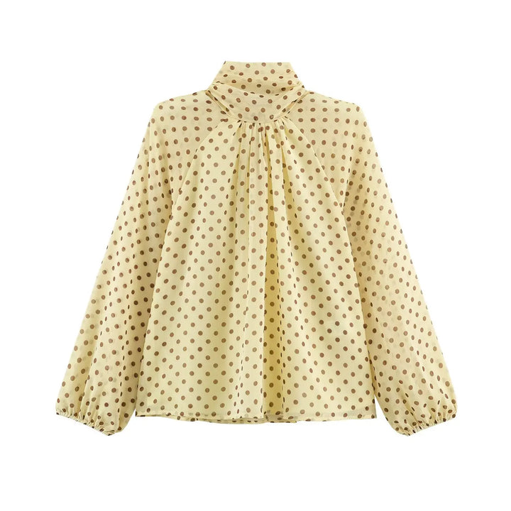 Beige polka-dot high-neck chiffon blouse with gathered front pleats and long puff sleeves