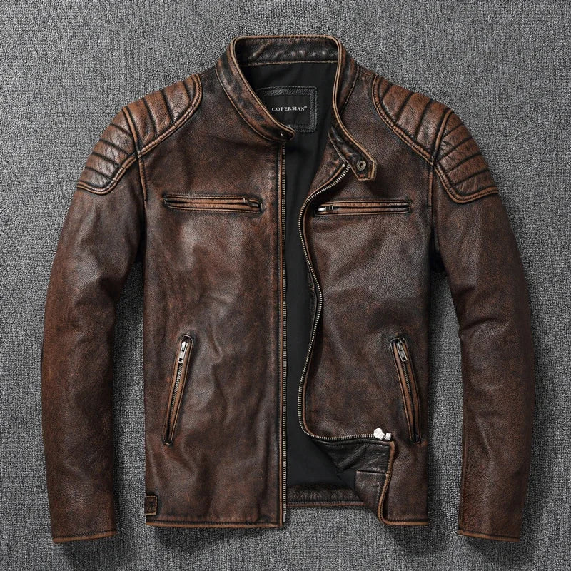 Brown leather jacket with zippers on a gray background
